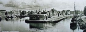 Havendijk-Spakenburg-oude-foto-Dam-tussen-oude-en-nieuwe-haven-1024x386.jpg